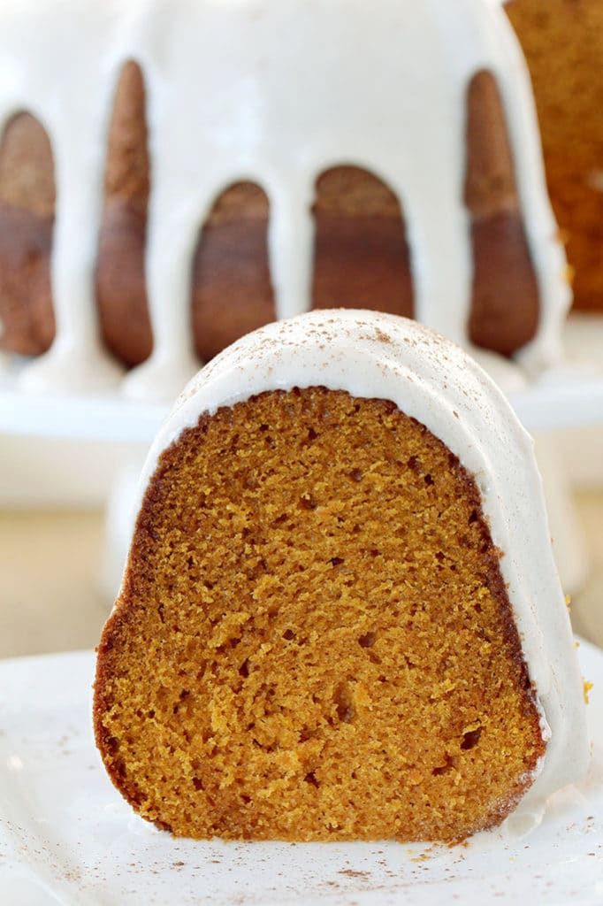 Pumpkin Bundt Cake with Cinnamon Cream Cheese Frosting is the recipe for delicious and easy, moist and spicy pumpkin cake – perfect for Halloween, or any other occasion during the pumpkin season.