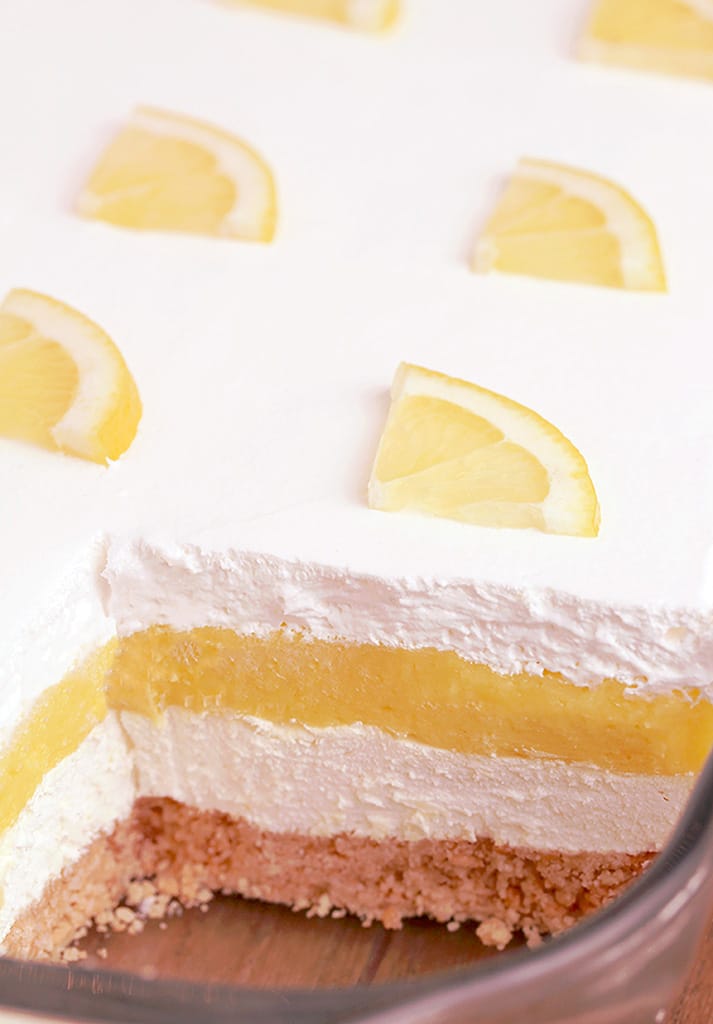Easy Lemon Cheesecake Lasagna is a quick and simple layered dessert just perfect for Easter. Tasty Golden Oreo base, cheesecake layer, lemon pudding layer and whipped topping on top. It´s so yummy and looks great, too.