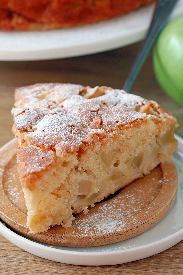 French Apple Cake – this soft and moist cake with rum and pieces of juicy apples and sugar topping is perfect for those who like simple, but delicious recipes.