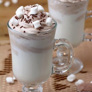 Whipped Hot Chocolate – hot or cold milk on the bottom of a cup, chocolate whipped cream on the top create an amazing flavor, when they are mixed together. This rich cup of hot chocolate also looks amazing. It is very quick and easy to prepare – only 3 minutes and 4 ingredients are necessary for you to make this perfectly creamy hot chocolate.