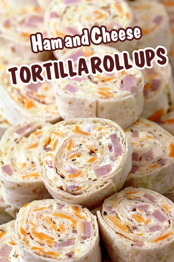 Ham and Cheese Tortilla Roll Ups are a must have party appetizer. These delicious bites are made of ham, cheddar cheese, mozzarella, cream cheese, mayo, mustard, garlic powder, onion, parsley and pepper – all rolled into a tortilla and cut into slices.