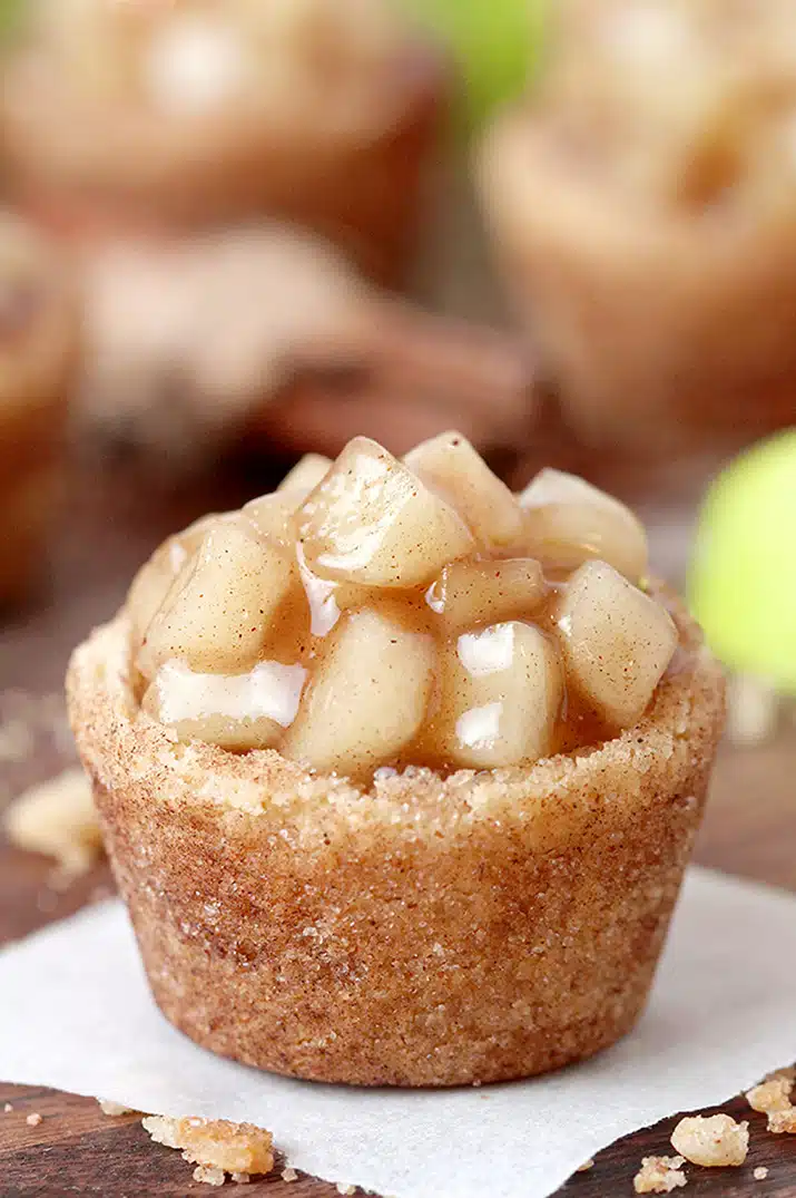 Snickerdoodle Apple Pie Bites – snickerdoodle mini cups filled with homemade apple pie filling are perfect small bites for all occasions. I like to prepare them for holidays because they look fancy on a holiday dessert plate and everyone loves their amazing taste.