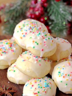 Italian Anise Cookies – soft cookies with sugar frosting and sprinkles simply melt in your mouth. These simple and very tasty holiday cookies are a perfect choice for Christmas and a great addition to your holiday cookie plate.