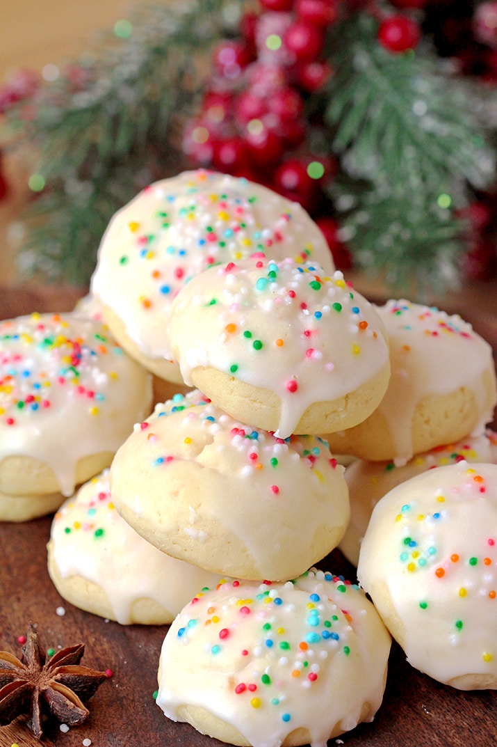 Italian Anise Cookies – soft cookies with sugar frosting and sprinkles simply melt in your mouth. These simple and very tasty holiday cookies are a perfect choice for Christmas and a great addition to your holiday cookie plate.
