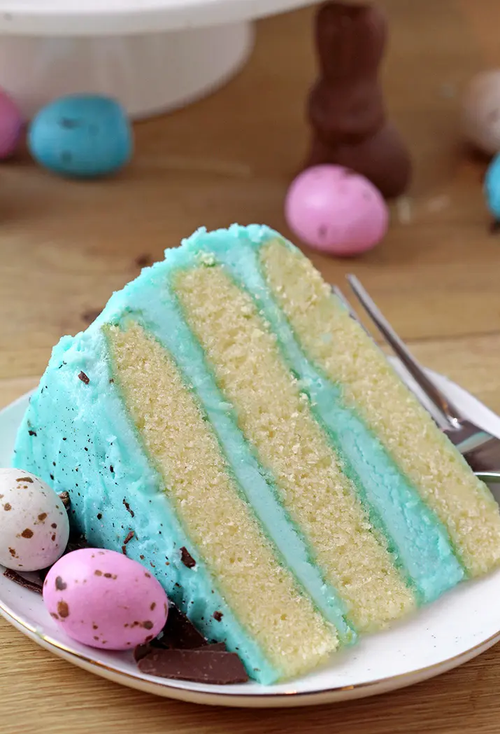 Speckled Egg Easter Cake – layers of soft vanilla cake with silky butter vanilla cream colored in blue and speckled pastel Easter eggs are a perfect choice for Easter dessert! 