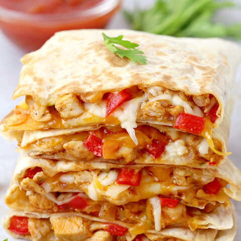 Easy Cheesy Chicken Quesadillas – this Mexican dish is so easy to make and it’s a perfect meal that can be prepared in no time! It can be a quick go-to lunch or a weeknight dinner made from simple ingredients with perfect taste. Crunchy tortillas filled with juicy chicken with lots of melted cheddar cheese and mozzarella, as well as pepper, taco sauce and taco seasoning are so delicious.